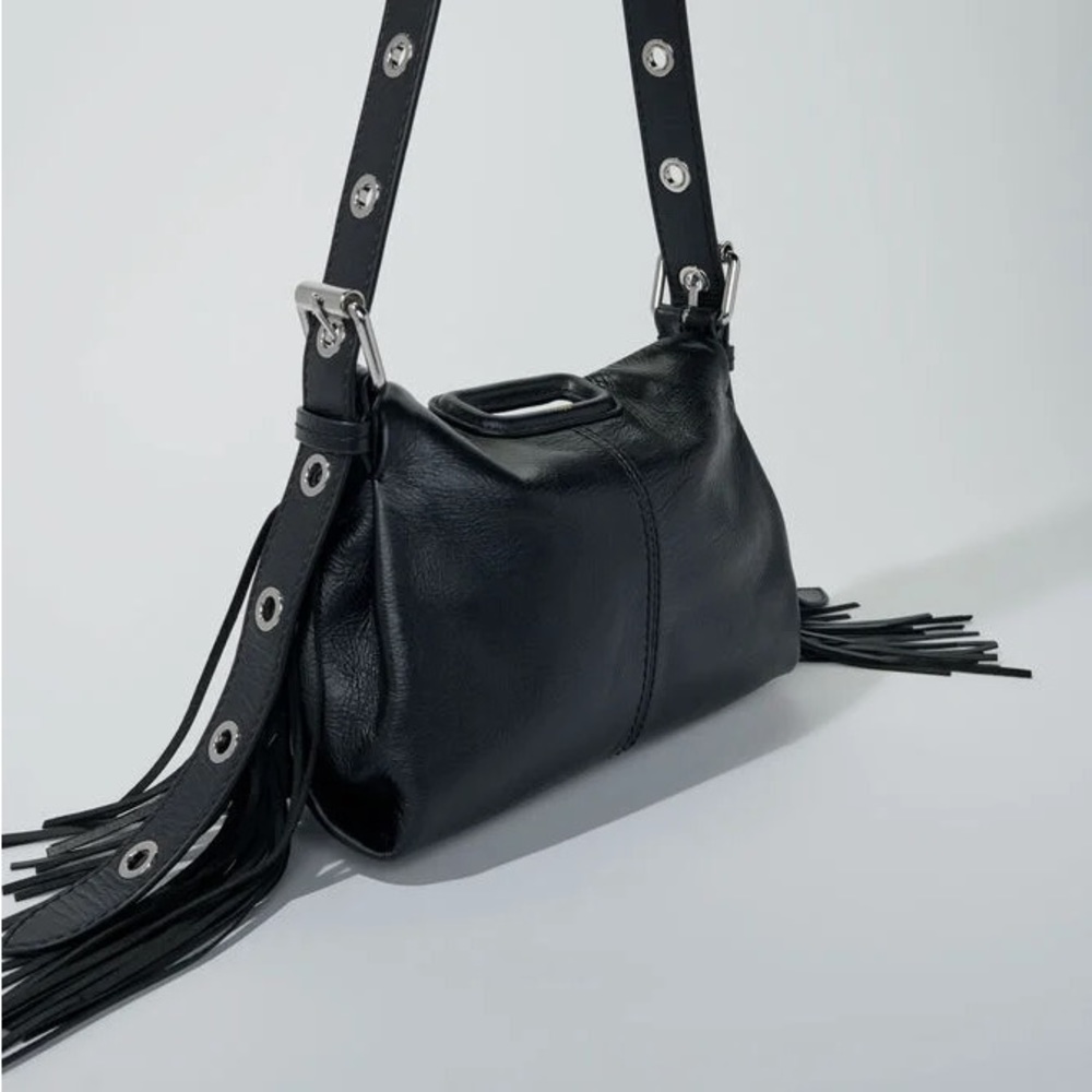 Maje Black Leather Shoulder Bag with Fringe and Grommet Strap